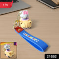 Cute Cartoon Cat Riding Toy Car Silicone Keychain (1 Pc)
